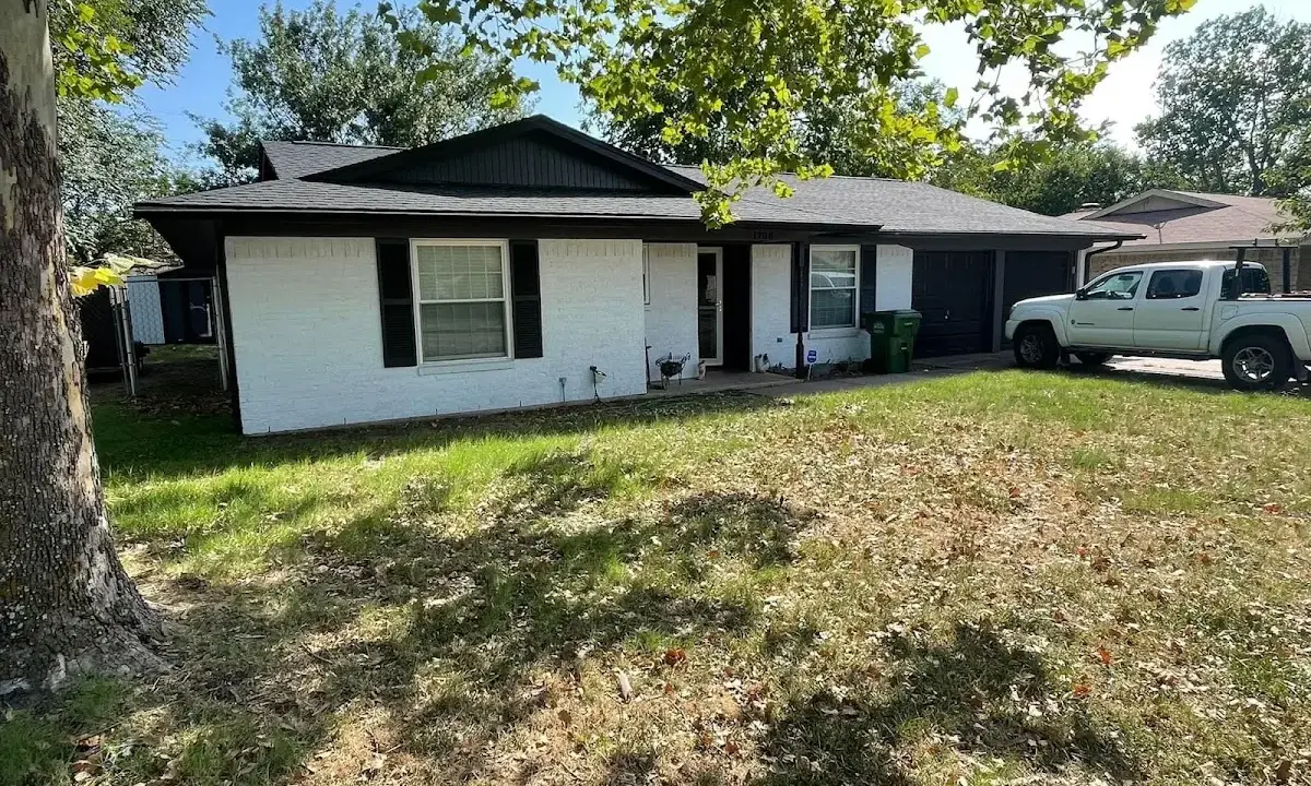 Professional roofing crew working on a residential roof in Margate
